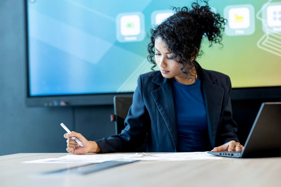 Business owner reviewing financial performance data