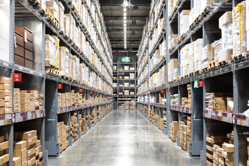 Distribution warehouse with rows of shelved inventory